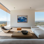 Modern living room with a large abstract painting on the wall, featuring a sofa, coffee table, and chair.