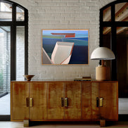 Artist Shilo Ratner Boat Painting ,Harbor, 30in x 40 in.Wooden sideboard with a lamp and abstract painting on a brick wall