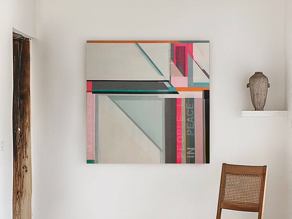 "Imagine" an abstract geometric painting on wood panel with pink, teal, gray, and beige blocks  inspired by John Lennons song Imagine hangs on a white wall by Artist Shilo Ratner.