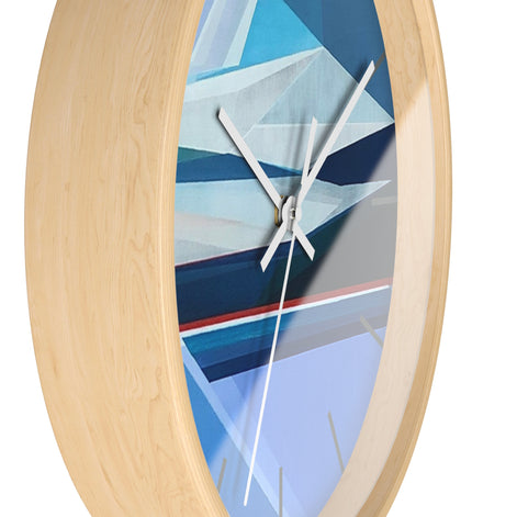 Wall clock with abstract geometric design on a white background